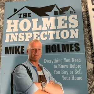 Two Mike Holmes books.    B7